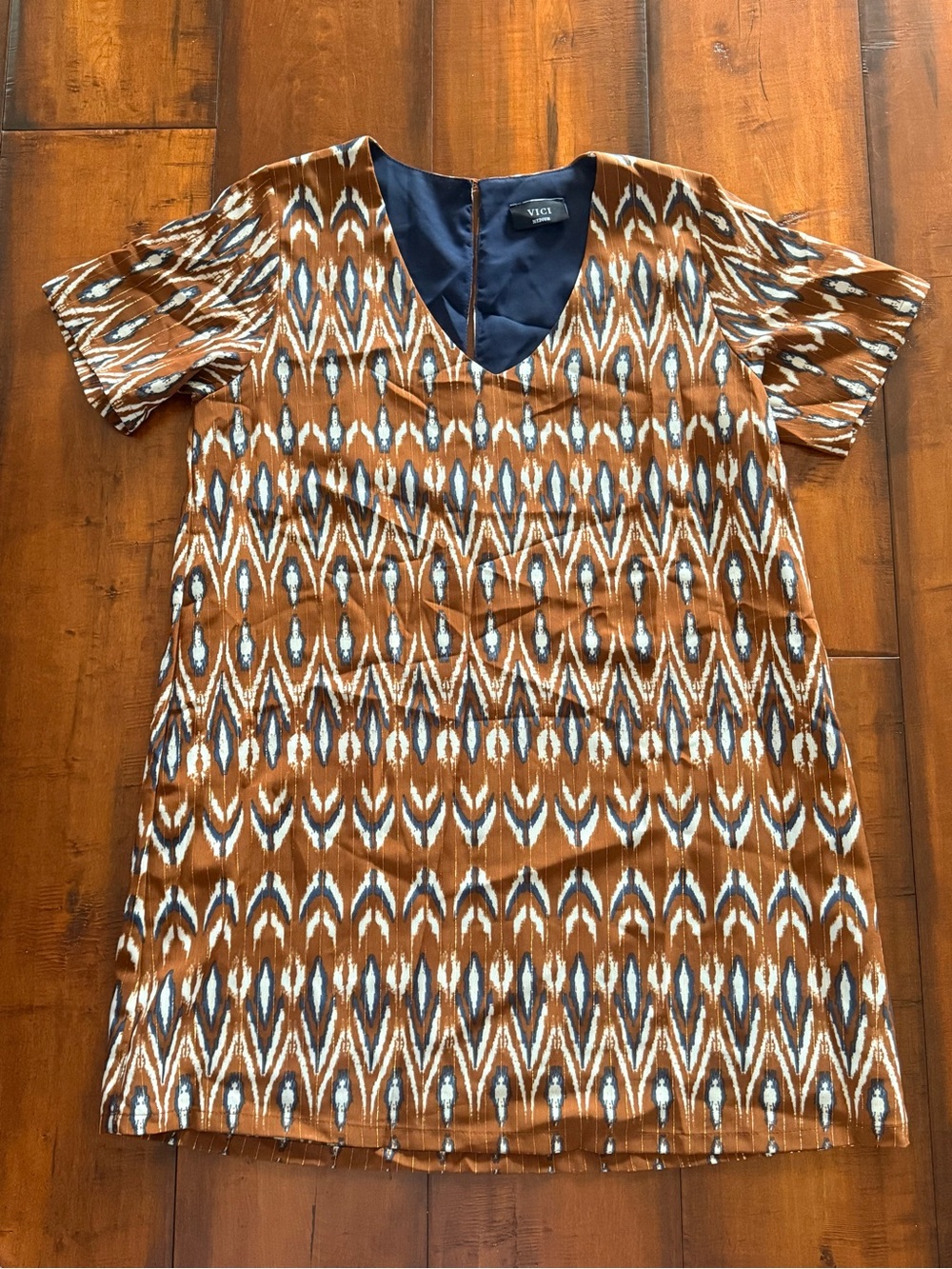 VICI Rust Ikat V-Neck Short Sleeve Shift Dress with Navy & Gold Accents